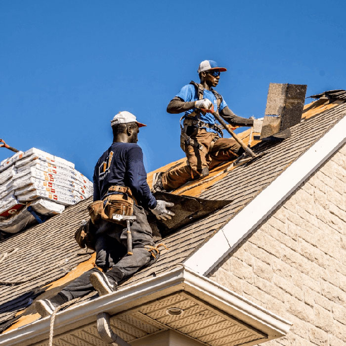Contact Us - Workers working on the roof